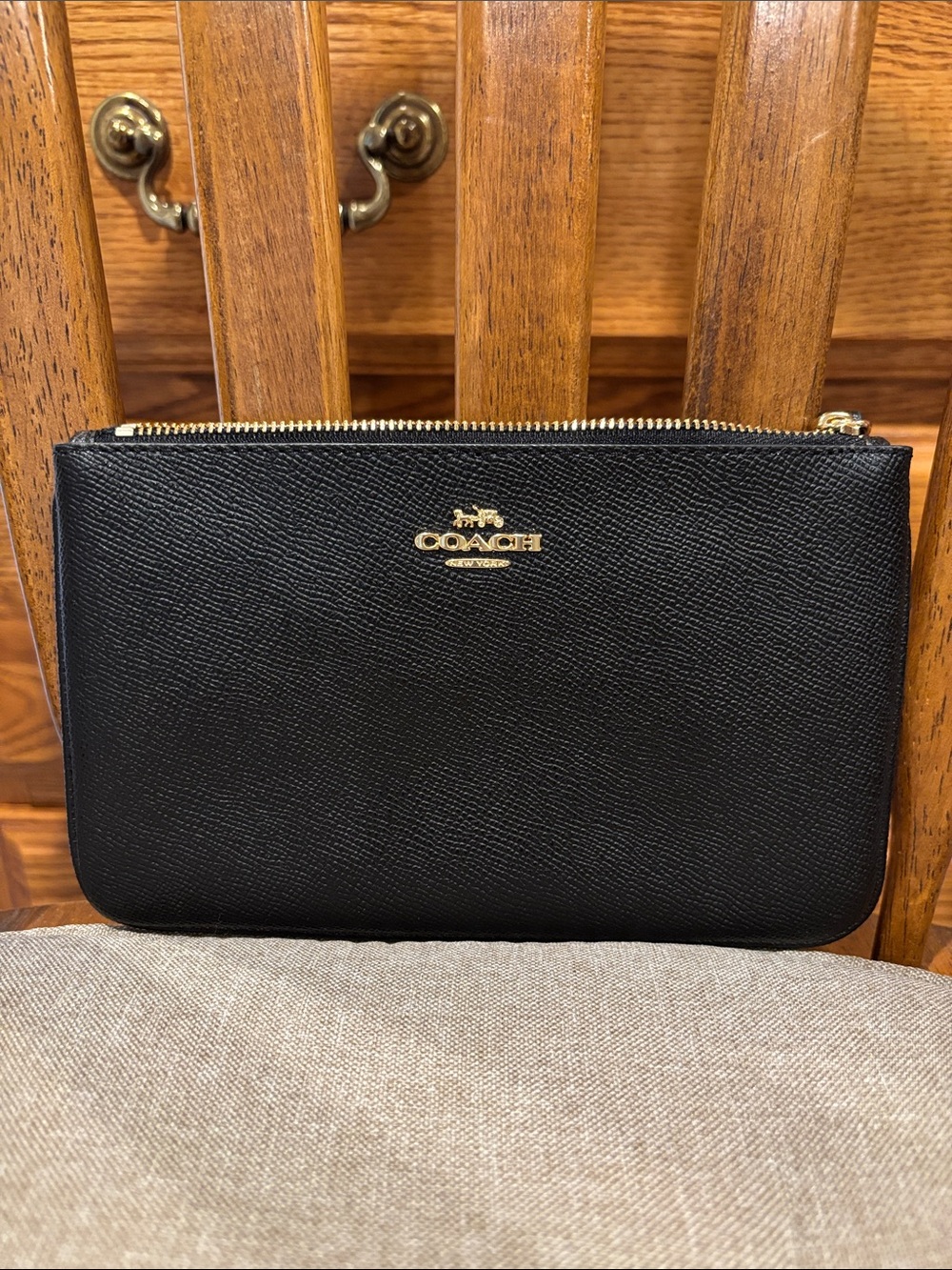 Coach Black Pebbled Leather Wristlet with Gold Logo
